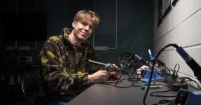 Young hacker at the European defense tech hackathon in Lithuania which is now coming to Prague