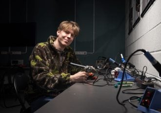 Young hacker at the European defense tech hackathon in Lithuania which is now coming to Prague