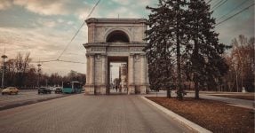 Historical Arc, with cars passing by, in the city center of Chisinau, Republic of Moldova.