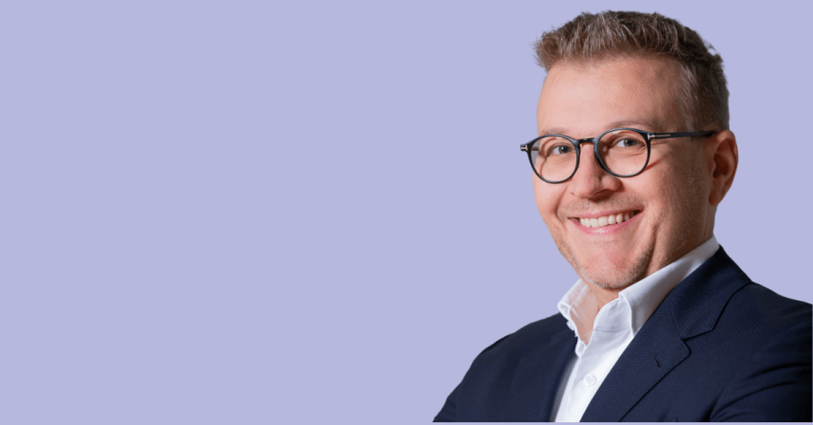 Image of Adam Niewinski, co-founder of OTB Ventures in Poland, with a purple background.