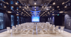 CEE startup events in 2023 showing an empty conference room with chairs and large screen