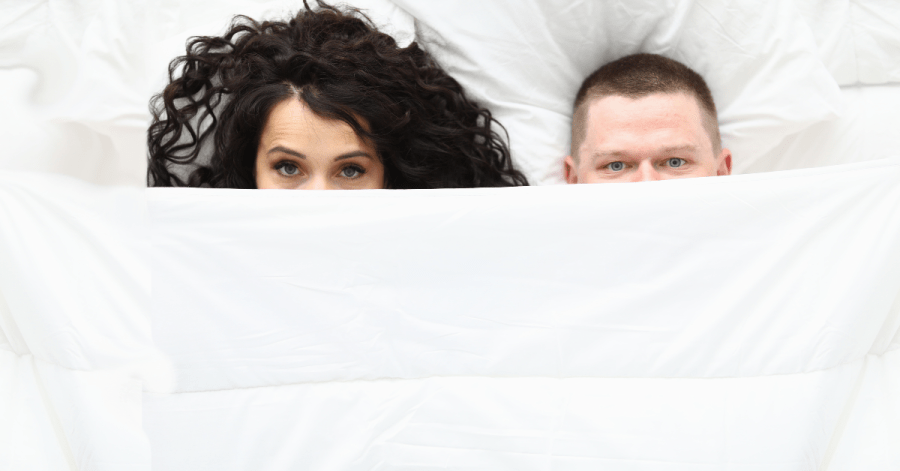 couple hiding under the sheets, canva
