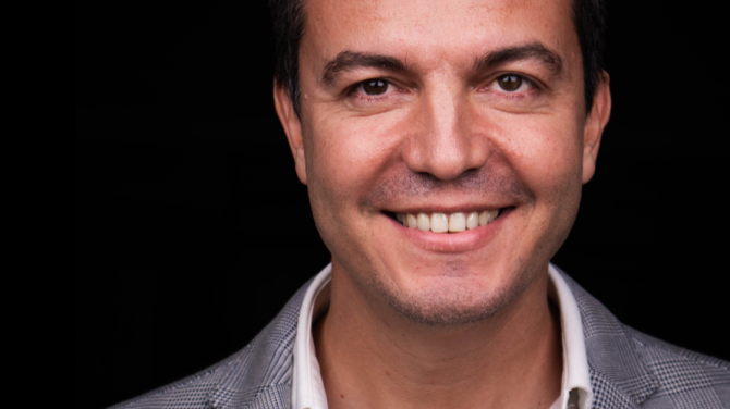 Scalefocus co-founder Viktor Bilyanski on a black background